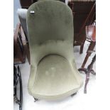 A Victorian tub chair having late moss green dralon upholstery, on turned front legs