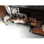 A 1980's Limited Edition bronze figure modelled as sleeping child by John Robinson, purchased from