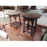 Two near matching 20th Century oak stools/occasional tables having octagonal top and turned legs