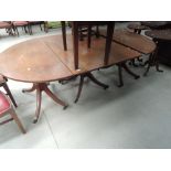 A 19th Century mahogany dining table centre of rectangular and 'D' end form on column and