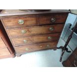 An early 19th century George III mahogany chest of two short and three long drawers having line