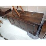An 18th century oak kist/coffer having panel front and stile frame, width approx. 150cm