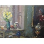 An oil painting, Liam Treacy, interior with lamp, signed and attributed verso