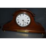 Mahogany mantle clock bearing brass plaque which reads 'From the Officers N.C.Os and Men D CO y 2 /