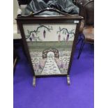 An early 20th Century oak framed embroidered fire screen, approx. 52 x 91cm