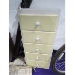 A vintage formica top narrow chest of 5 drawers, approx. dimensions W41cm H94cm