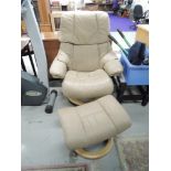 A Stressless armchair and footstool, in beige leather