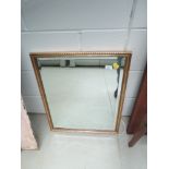 A gilt frame wall mirror, approx. dimensions 50 x 60cm