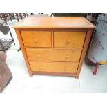 A modern light wood two over two bedroom chest, having self soft closing drawers, approx. Width