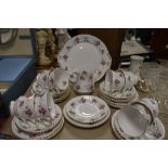 A part tea set 'Royal Windsor, cottage roses' including cups and saucers , cake plate and jug.