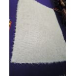 A traditional Flokati/fleece rug, approx. 244 x 170cm