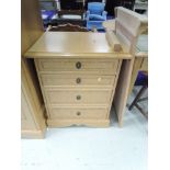 A modern golden oak bedroom chest of four drawers, approx. Width 65cm
