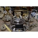 A selection of plated ware including dressing table set, tureens , candle snuffer and more.