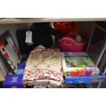 A variety of items including photo frames , curtains, games and jigsaw puzzles, flexible storage