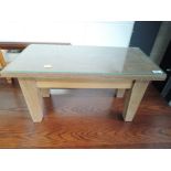 A craftsman made oak coffee table of small proportions, approx. 60 x 30cm, height 33cm, with glass