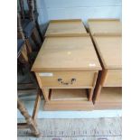 A pair of golden oak bedside cabinets (one with sticky label on front)