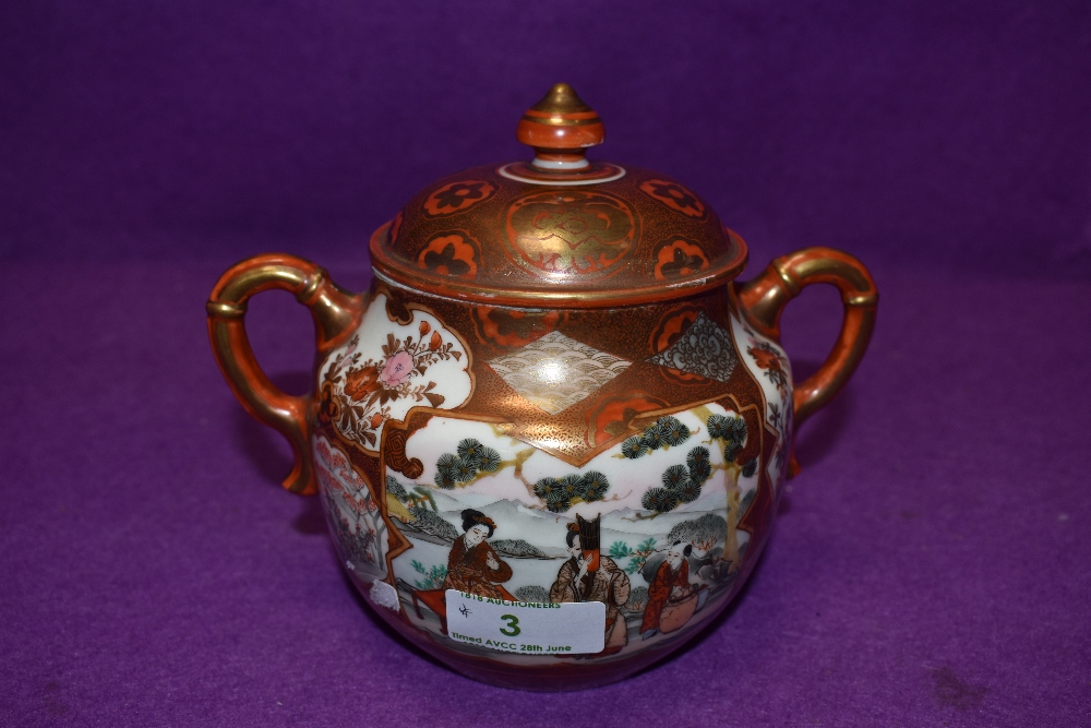 A hardpaste Chinese export sugar bowl or similar highly decorated with floral panels and Geisha