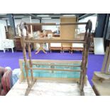 A reproduction Victorian style towel rail, approx. width 64cm