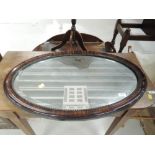 A coromandel style wall mirror, approx. dimensions 48cm x 76cm