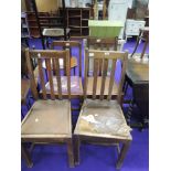 Four (three plus one) early to mid 20th Century oak dining chairs
