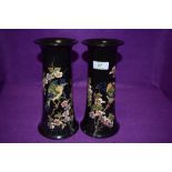 A Pair of Bretby vases having bird and blossom hand painted design, impressed underside with 'Bretby