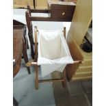 A vintage folding frame laundry bag, approx. dimensions 60 x 47cm