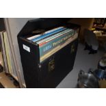 A vintage vinyl case containing an array of LP records including classical and musical interest.