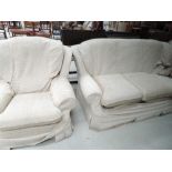 A modern cream three piece lounge suite, approx. settee width 190cm