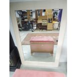 A modern laminate light colour mirror, approx. dimensions 120 x 80cm