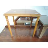 A modern rubberwood style occasional table, approx. 46 x 33cm, height 43cm