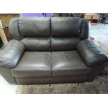A modern brown leatherette settee , approx. width 160cm