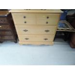 A modern beech style bedroom chest of three drawers, top set, dummy doublem approx. Width 90cm