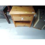 A modern pine bedside drawer unit , approx. Width 45cm