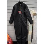 A Hellyhansen medium sized thermal suit.as new with tags.