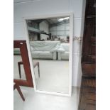 A vintage painted wall mirror, approx. dimensions 64 x 123cm