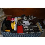An interesting box containing a vintage Brownie' Eight-58 projector and projector components