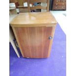 A vintage oak sewing machine cabinet (no sewing machine)