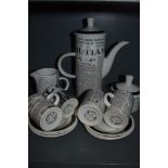 A quirky part coffee set having newspaper transfer print ' cinque ports pottery Ltd, The Monastery