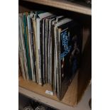 A selection of vinyl records including Jazz albums