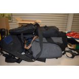 A large collection of camera bags