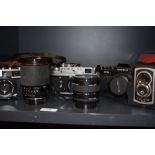 Four cameras. A Olympus 35RD, a Zorki 4K, a Yashica FR1 and a Ross Ensign Ful Vue as well as a