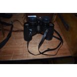 A pair of Swift Apollo 8x30 binoculars in case