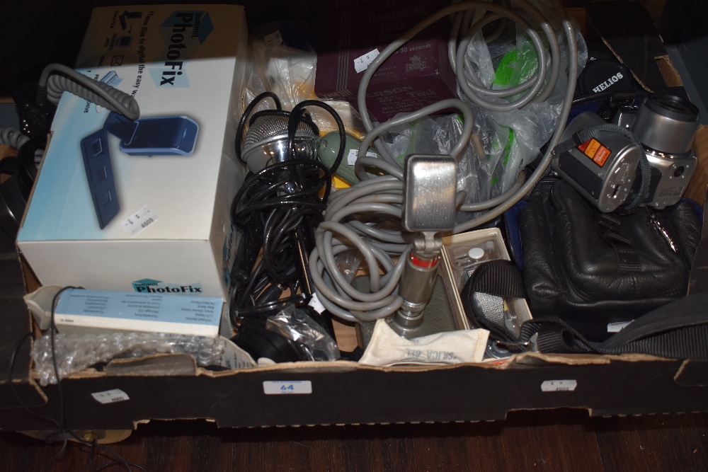 A box of various cameras, parts microphones etc