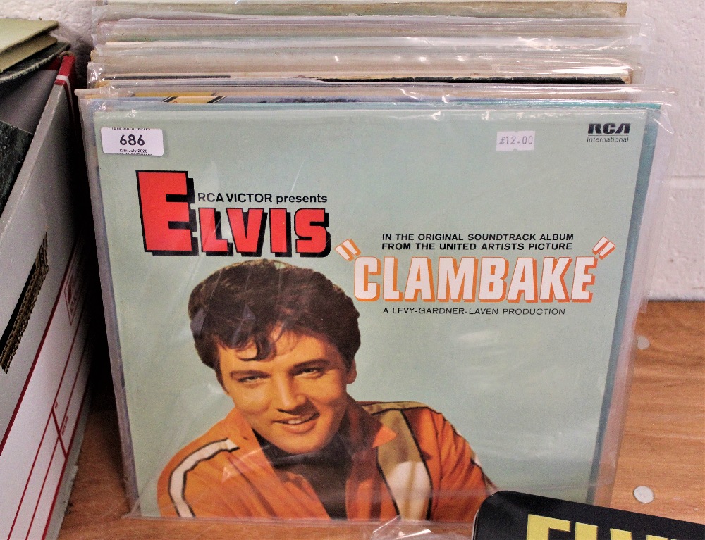 A lot of various Elvis Presley album with some rare pressings , also includes magazines and a