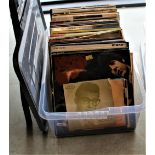 A large box of vinyl albums with some interesting titles on offer