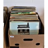 A lot of one hundred vinyl albums , a mixed selection with jazz , vocal and instrumental , rock