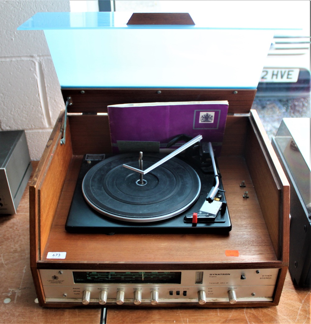 A vintage Dynatron Turntable system with tuner and original manual