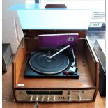 A vintage Dynatron Turntable system with tuner and original manual