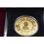 A Gold Fifty Pound Coin. The 2018 Sapphire Coronation Gold Fifty Pound Coin. Mintage just 26