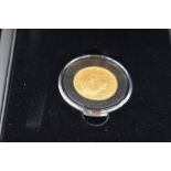 A Gold Sovereign. An 1830 George IV 1825-1830 coin gold sovereign. In a case. These coins are all